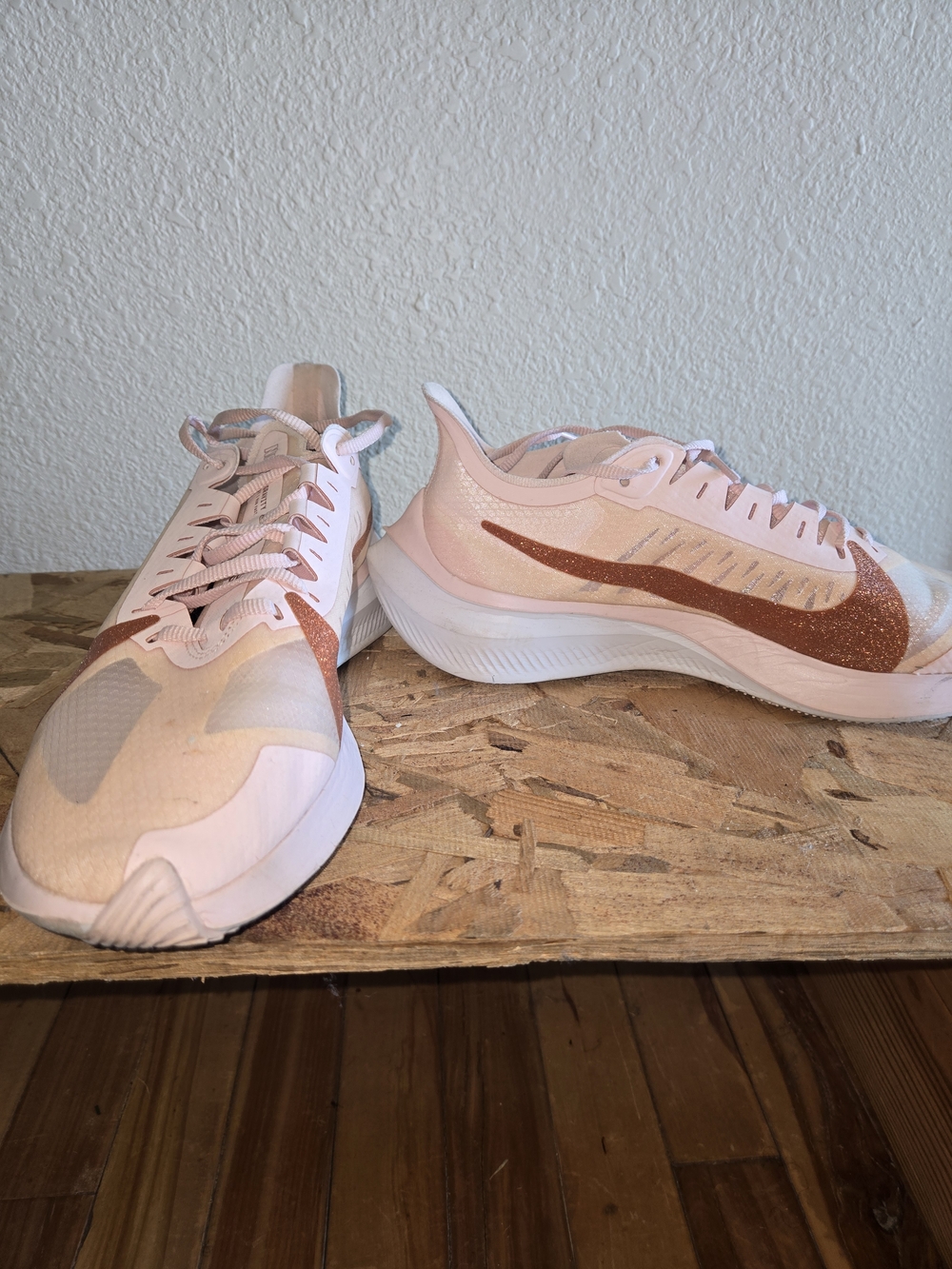 Nike Women's Running Shoes in Light Pink with Rose Metallic Swoosh